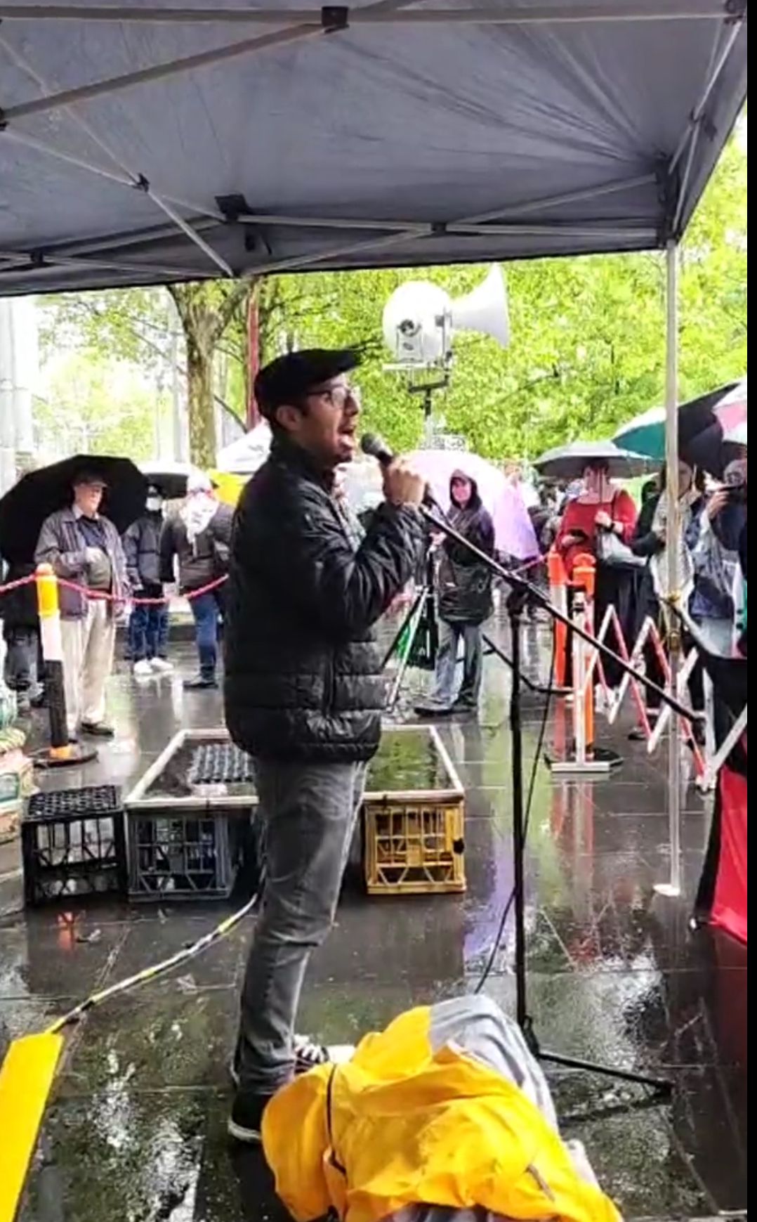 Omar Hassan speaking at 6 October Rally