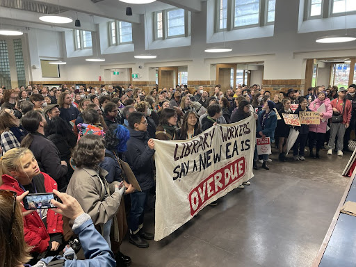 Uni workers at a meeting