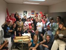 Unionised call centre workers in Melbourne, 2019 (note the epic union noticeboard behind them).