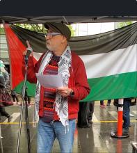 Jorge Jorquera speaking at rally